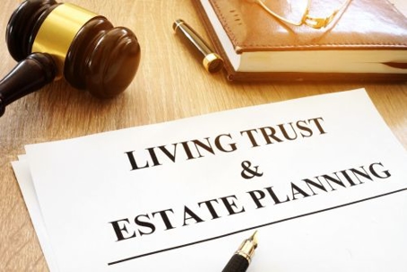 paper with Living Trust & Estate Planning written on it