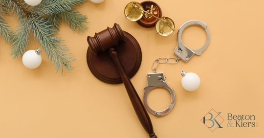 gavel, handcuffs, and holiday decorations
